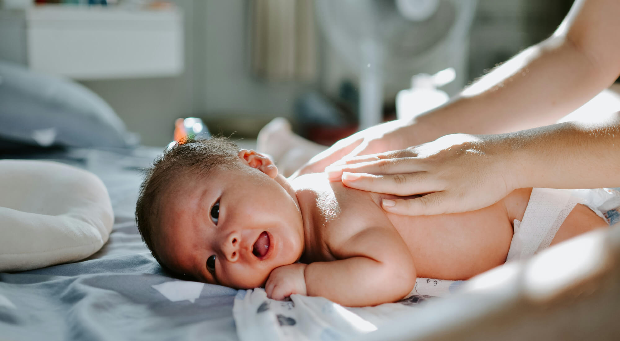 Baby receiving a massage